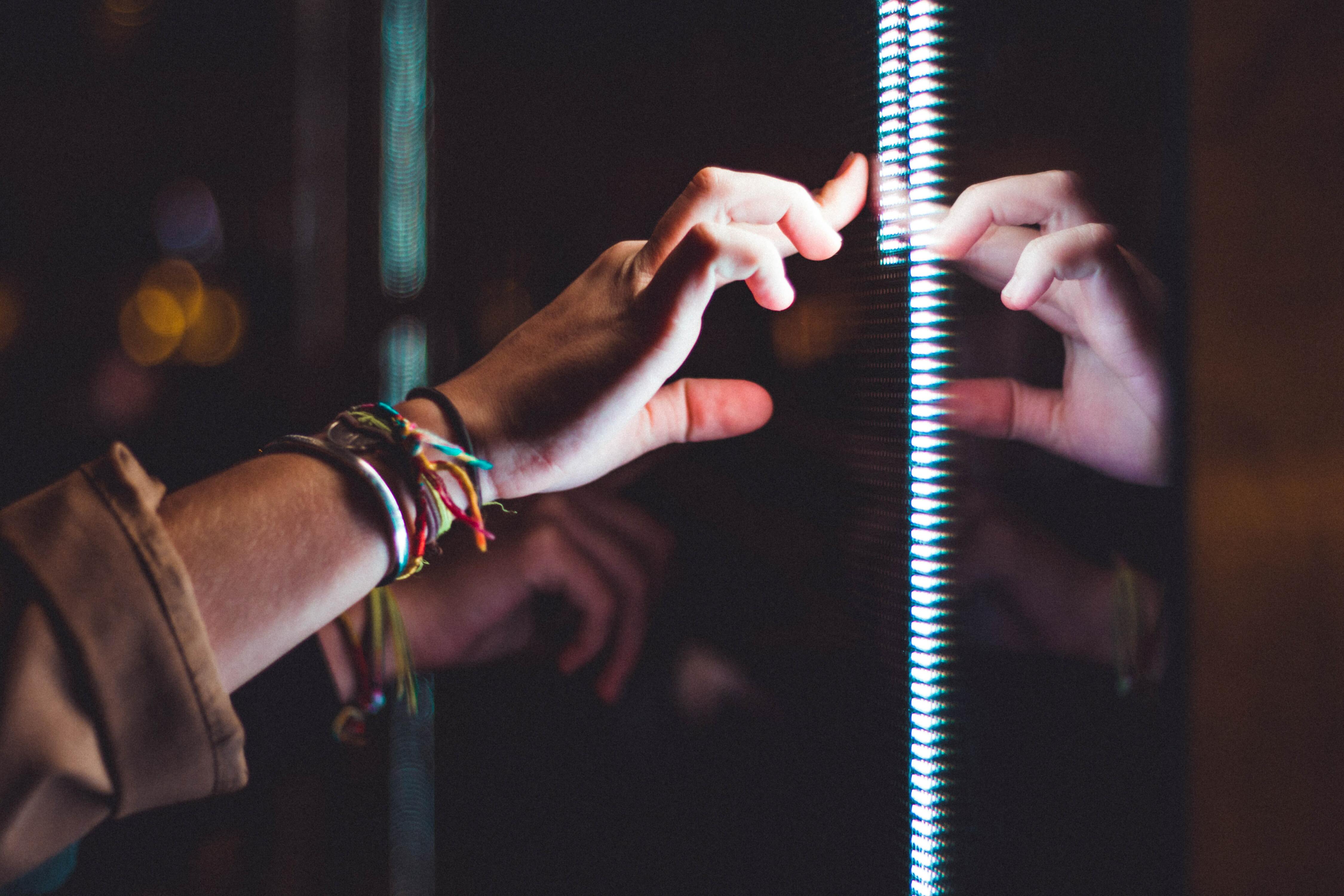 Hand interacting with a screen