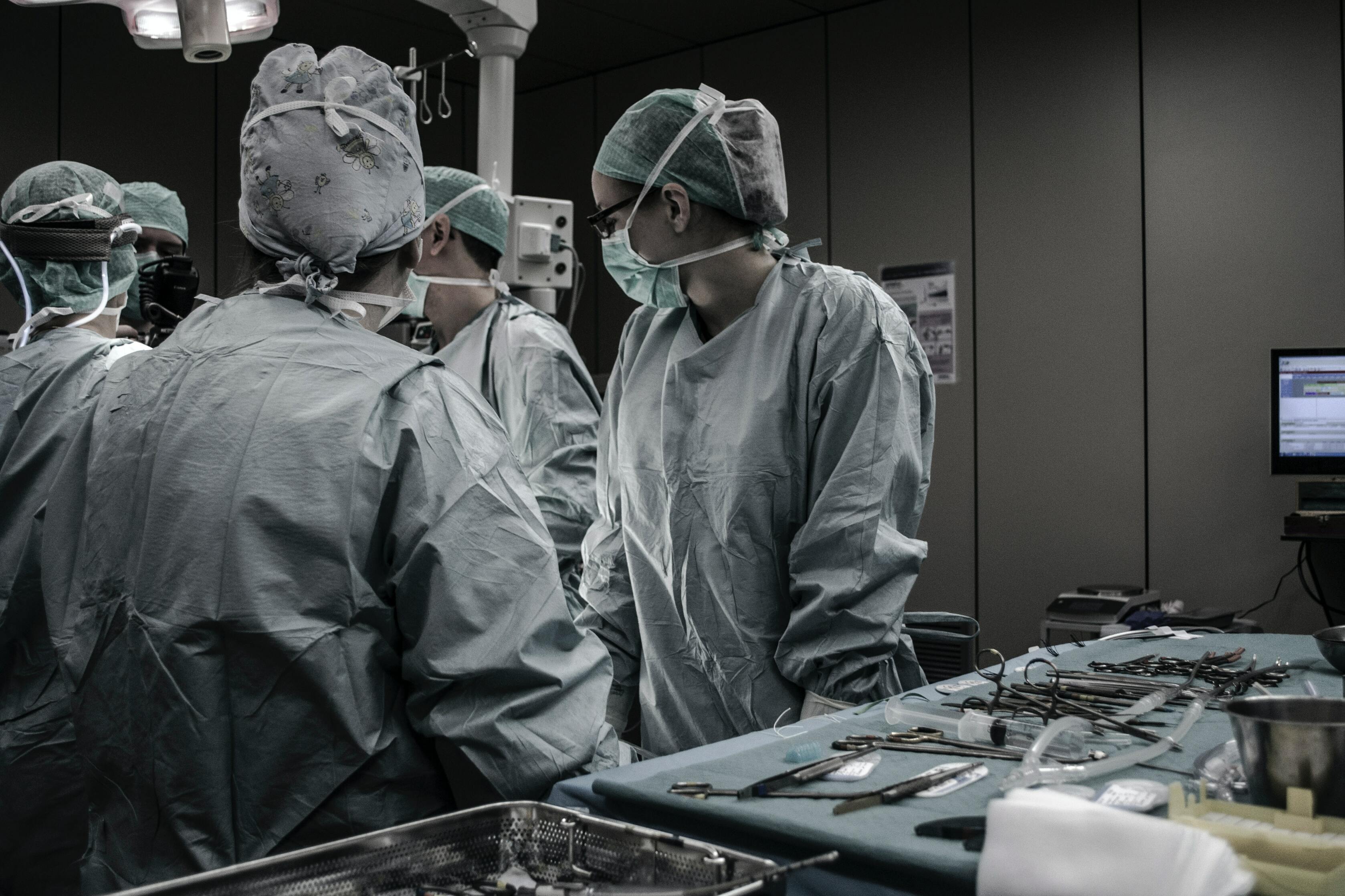 Doctors doing surgery in an operating room